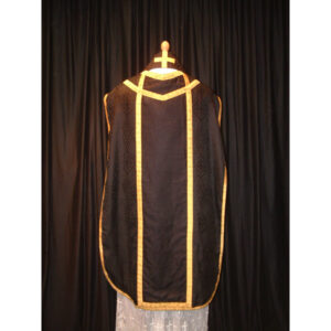 Black demask with gold braid